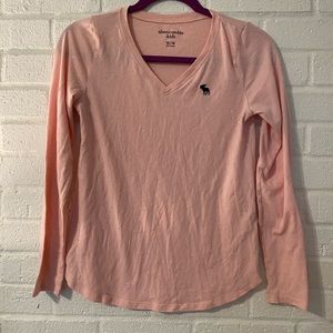 Sparkles!! Cute, long sleeve pink top.
